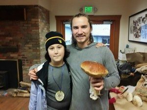 Volunteers with King Bolete (porcini) found in Westwind's forest during Stewardship Weekend.
