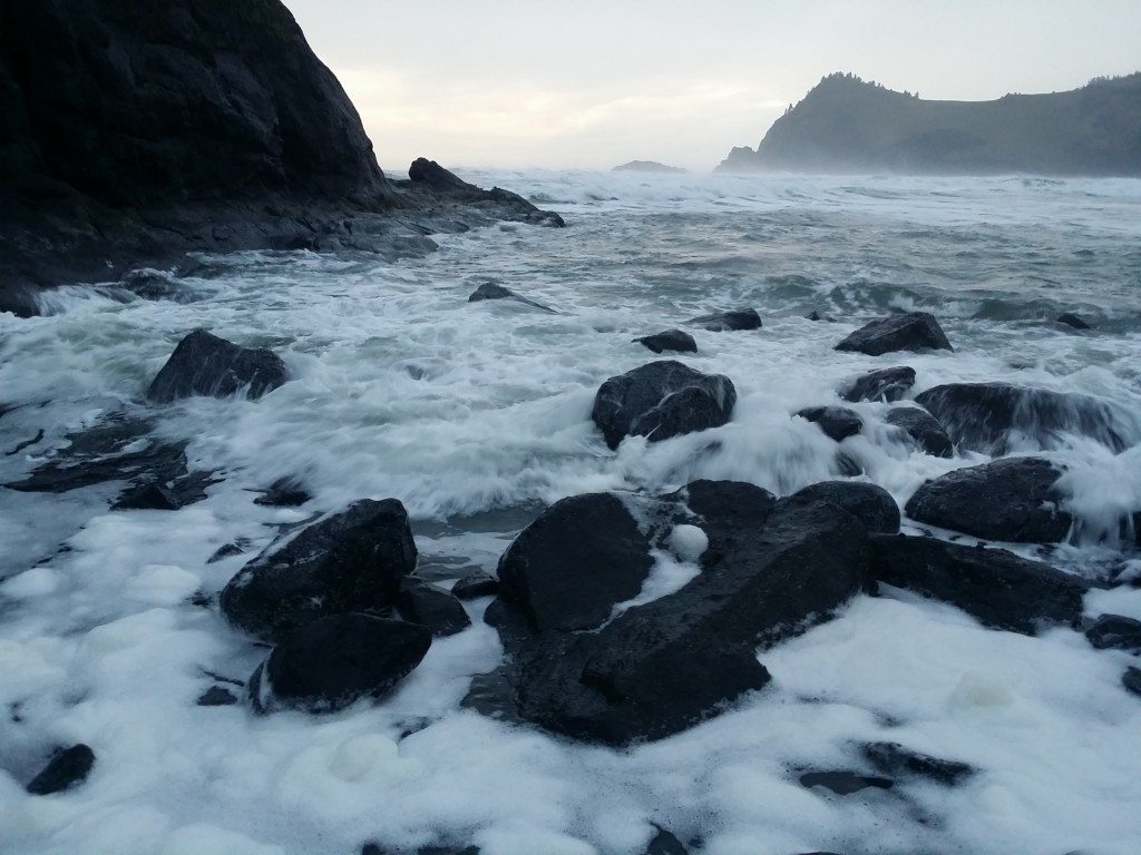 Sea Foam amidst newly exposed rocks near Needle's Eye