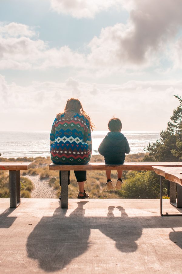 Mom and child looking at the ocean