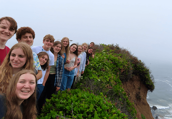 Teen campers on the coast