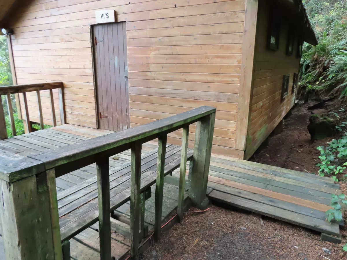 Wooden porch and front of "Vi's Place" cabin