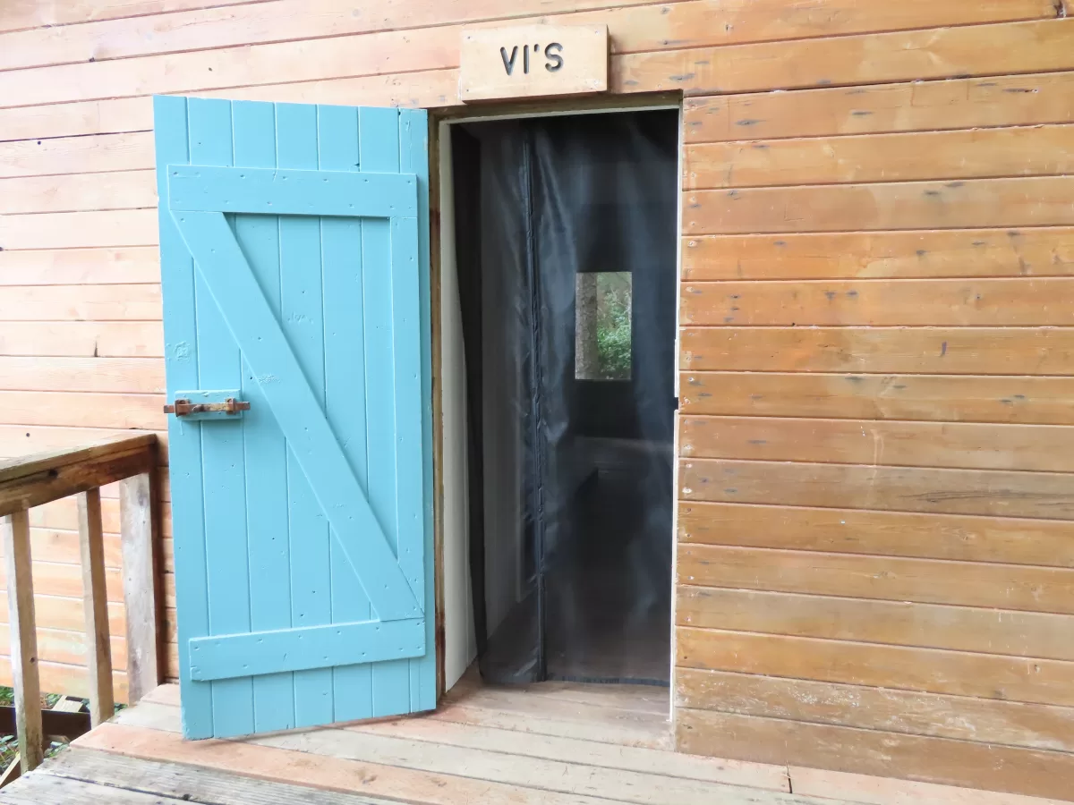 Front door open, view inside "Vi's Place Cabin."