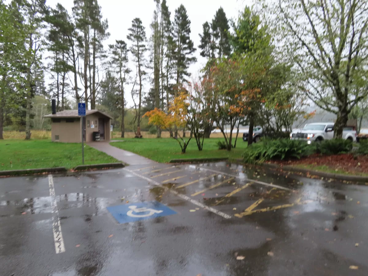 ADA Parking space with paved path to bathrooms.