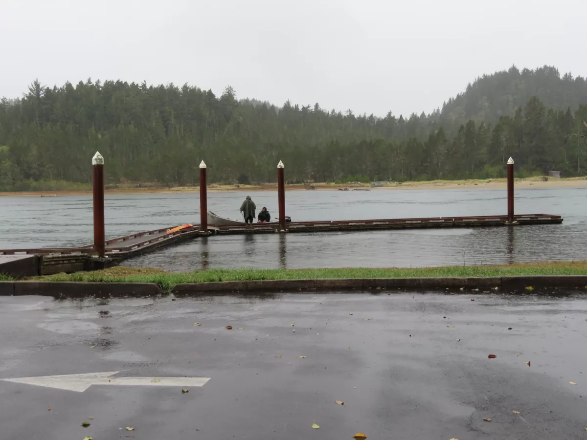 Floating dock on the Salmon River. Westwind beach on other side of river.