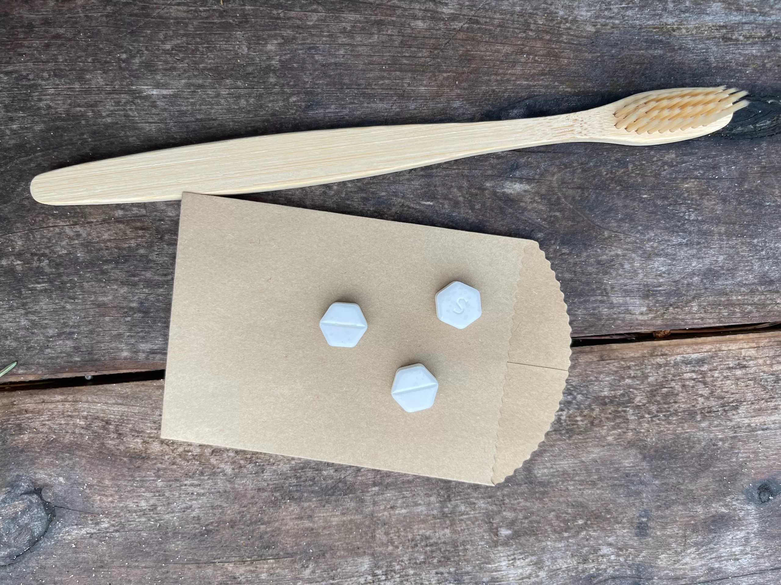 bamboo toothbrush and toothpaste tablets