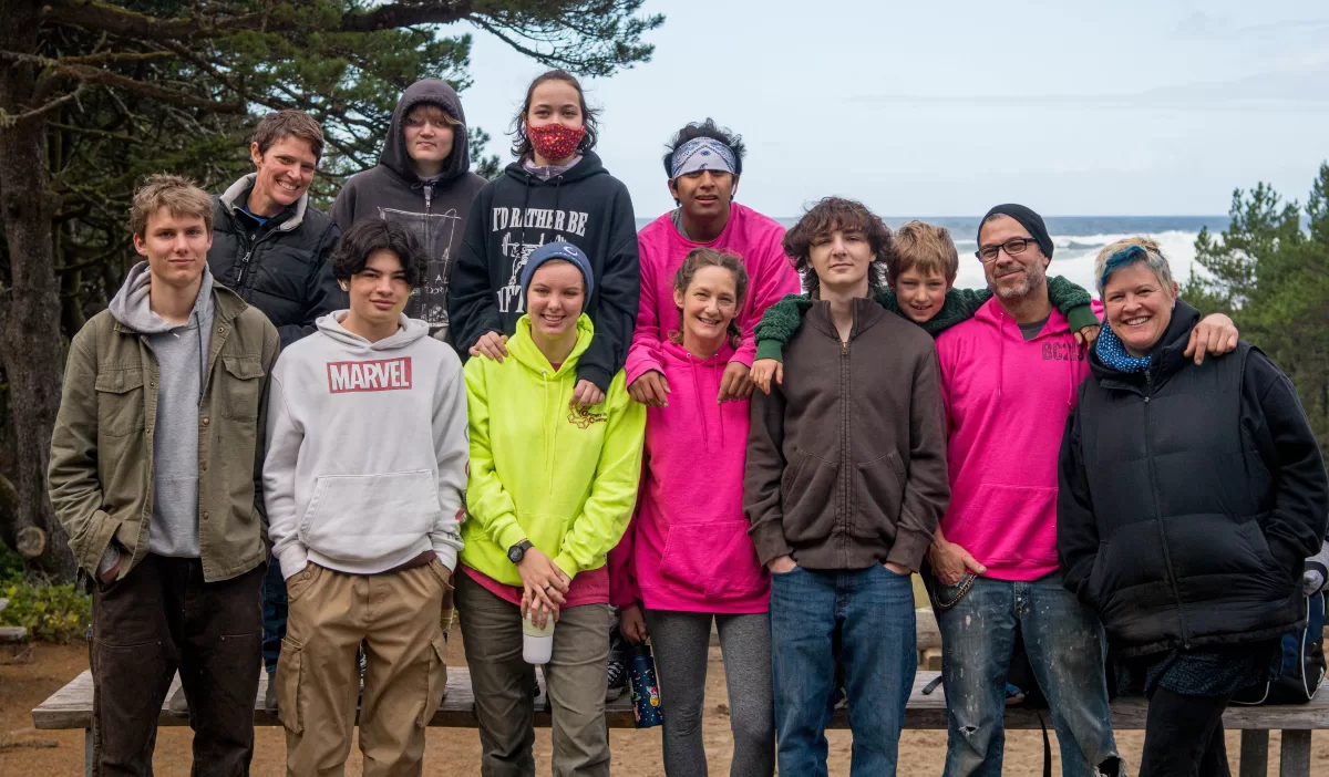 A group of high school students pose for a photo.